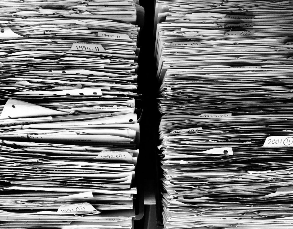 Files, paper, office — Assessable Earnings: What They Are and Why They Matter for Employers